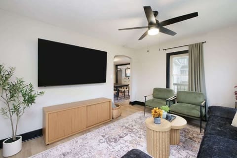 Relaxed living area w/ TV, plush seating & space to unwind after a day out