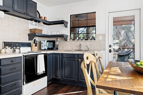 Whip up something delicious in the cozy kitchen, with everything you need for home-cooked meals.