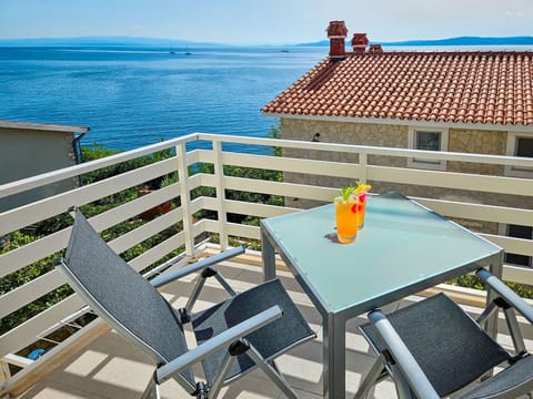 Water, Furniture, Table, Property, Tableware, Sky, Building, Chair, Blue, Outdoor Table