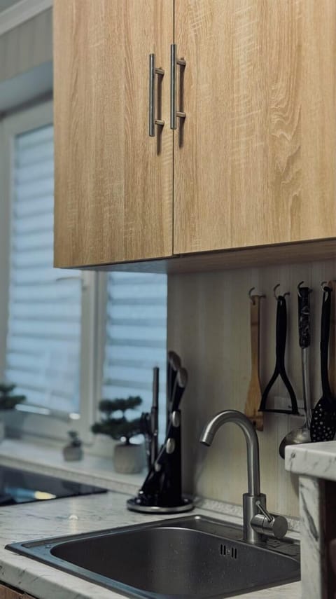 Mini-fridge, microwave, stovetop, cookware/dishes/utensils