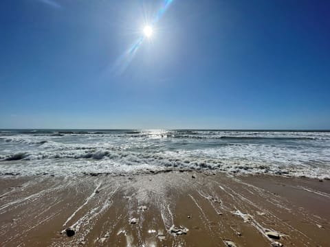 On the beach, white sand