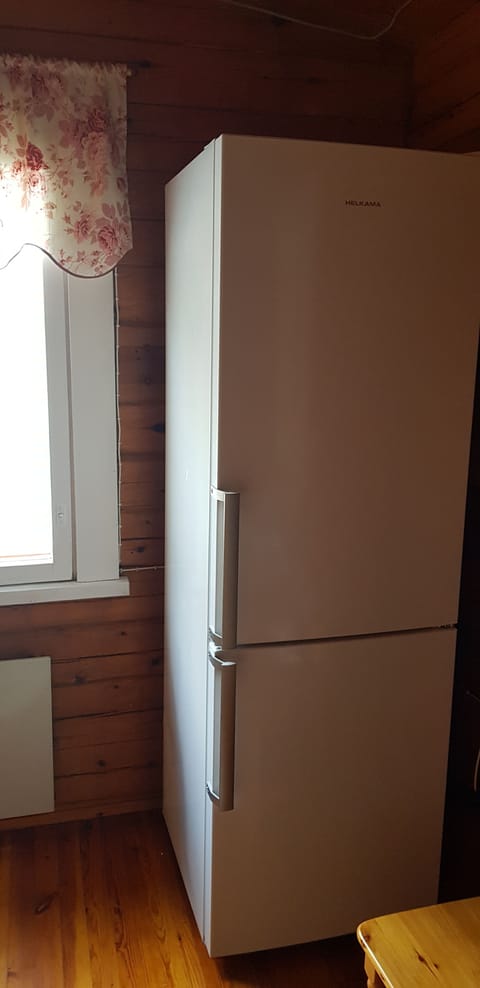 Full size fridge freezer in the kitchen