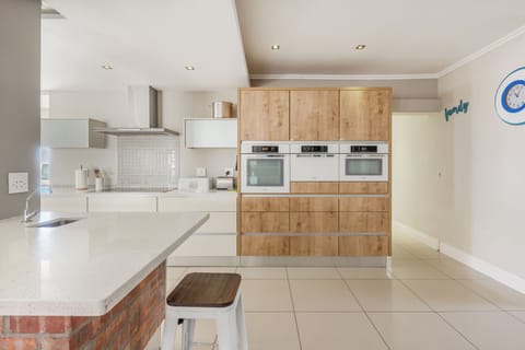 Kitchen is open & spacious, yet everything is within reach for easy meal prep.