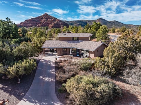 Soak in red rock views from this stylish getaway nestled among pines—your private haven minutes from trails, shops, and stargazing skies.