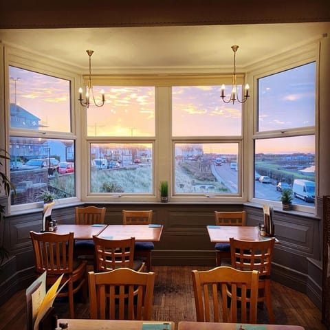 Dinner served, British cuisine, ocean views 