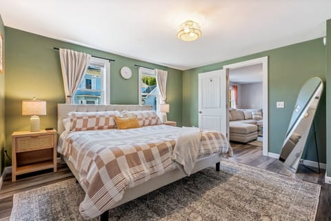 Relax in luxury in our master bedroom, featuring a king size bed, 43" Roku TV.