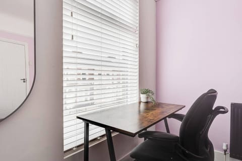 Bedroom 1:

Features:
- 1 x Superking Bed
- Garment Hanger Space
- Work Desk
