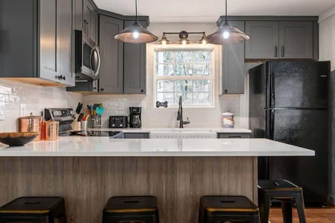 Cook, chat, and enjoy the comforts of home in this open, inviting kitchen.