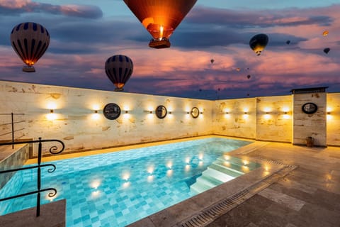 Seasonal outdoor pool, pool umbrellas, sun loungers