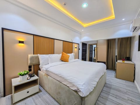 Premium bedding, desk, laptop workspace, free WiFi