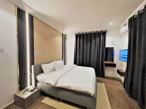 Family Room, Balcony, City View | Desk, laptop workspace, free WiFi