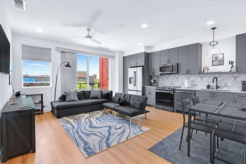 Curl up in the chic living room & stream all your favorite entertainment