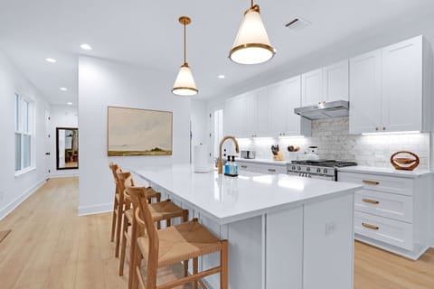 Whip up culinary masterpieces in the sleek, fully equipped kitchen