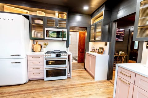 Elegant, retro finishes and incredible amenities in the kitchen are sure to delight