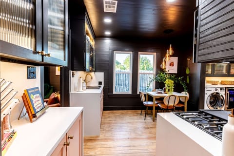 Enjoy seating for 4 at the kitchen table, a perfect spot for meals & games