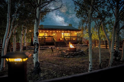 Relax under aspens with string lights, a fire pit, and fresh mountain air.