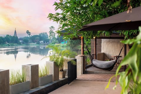 Villa, River View | Living area | Fireplace