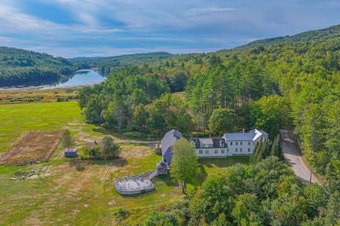 60 Acres of ultimate privacy among fields, private lake/docking system,  hiking & snowmobiling directly from property is a recreation dream