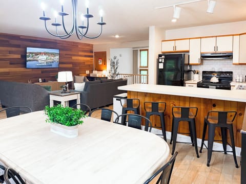 The open kitchen and dining area is perfect for groups