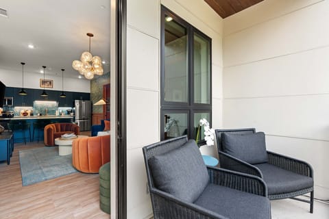 Enjoy your morning coffee on this private patio, just steps away from the comfort of your stylish living space