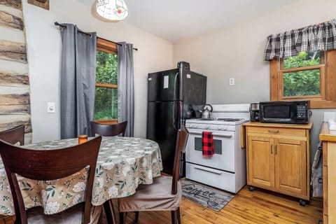 Kitchen and dining areaFully Equipped Kitchen: Stove, oven, refrigerator, microwave, coffee maker, toaster, wine glasses, and all cooking basics