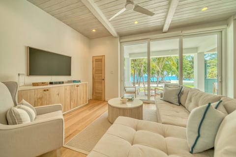 Large open concept living just steps from the sand with beautiful ocean views
