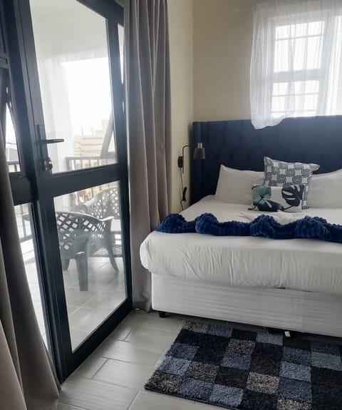 Deluxe Room, 1 King Bed, Balcony, Sea View | Individually furnished, desk, laptop workspace, blackout drapes