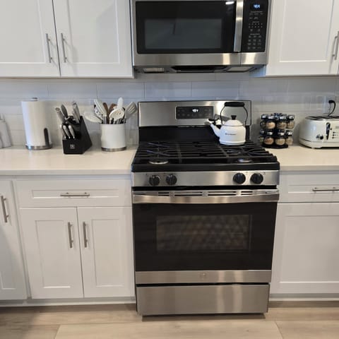 Kitchen with Gas Stove and fun gadgets.