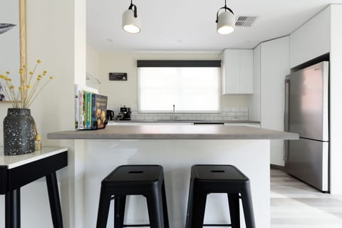 twin bar stools, making entertaining a dream
