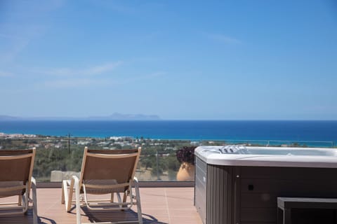 Immerse yourself in pure relaxation with jacuzzi and sea view.