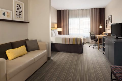 Hypo-allergenic bedding, down comforters, desk, blackout drapes