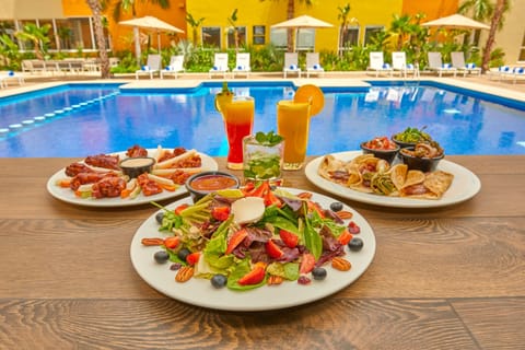 Outdoor pool, pool umbrellas, sun loungers