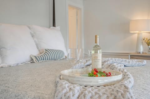 Relax in comfort with a touch of elegance and a bottle of wine.