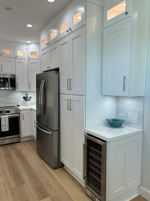 Brand new, fully stocked kitchen with all new appliances and wine fridge  