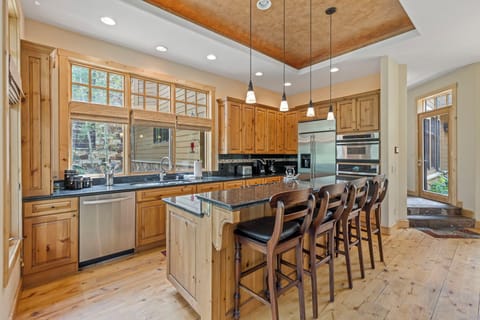 Bar area off of full kitchen with seating for 4 people.