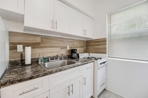 Equipped kitchen with essentials, easy meal preparation and convenience