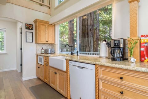 The open, airy kitchen offers ample space & every home comfort