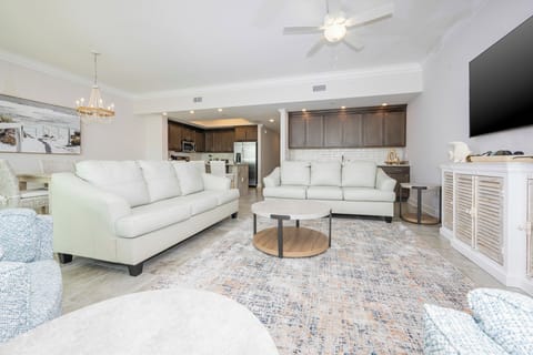 Relax with a good movie after a day full of beach adventures in this stylish vacation rental and unwind