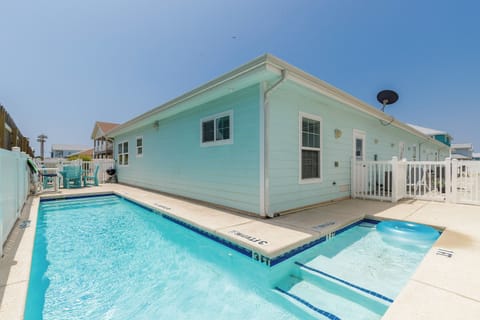 Steps right from the home to the community pool that is shared with other units