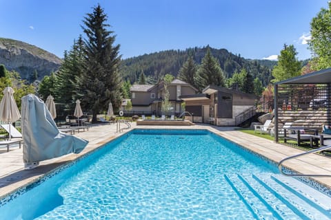 Refreshing community pool, hot tub, and tennis court
