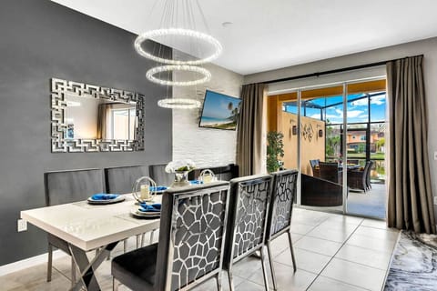 Professionally designed spacious and luxurious living space with decorative fireplace#Disney #Parks #kingdom #springs #RegalOaks #resort #Vacation #Rental #waterpark #Kissimmee #Orlando #universal #citywalk