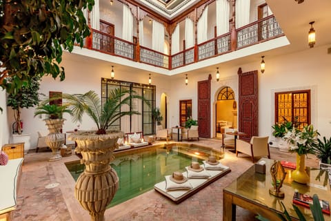 Outdoor pool, open 8:00 AM to 8:00 PM, sun loungers