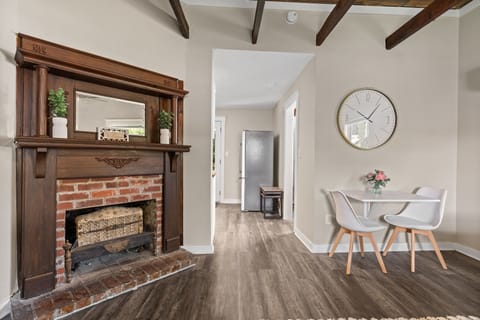A stylish table for two  and a clear view of the indoor fire.