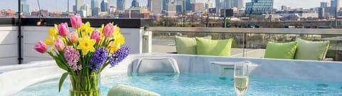 Experience Nashville luxury at this stylish rooftop oasis! Relax in the hot tub with stunning city views and vibrant flowers. Ideal for large groups, family reunions, or bachelorette parties, it's the perfect Music City retreat!