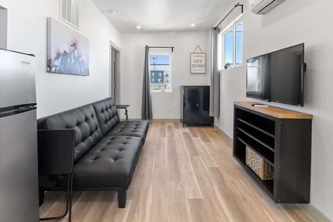 Futon open living room and kitchen