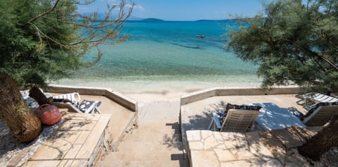 Beach with sun loungers