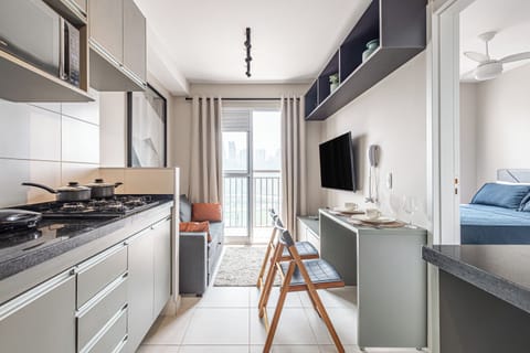 City Apartment, 1 Bedroom, Balcony, River View | Living area | Flat-screen TV