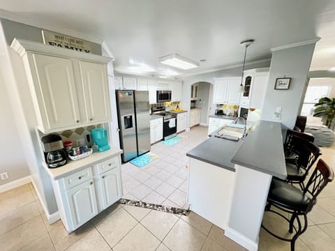 spacious kitchen w/ coffee/tea bar & everything you'll need to enjoy your coffee