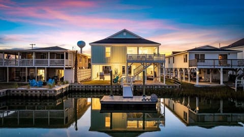 Stunning curb appeal and the perfect blend of modern luxury and beach vibes.