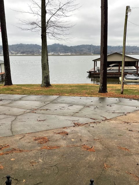 Outdoor parking area and views of lake